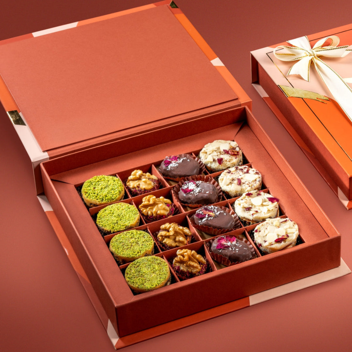 Open Assorted Collection gift box with Ranginak, walnut & dried fruit wholes, paan bites, and Persian rose delight.