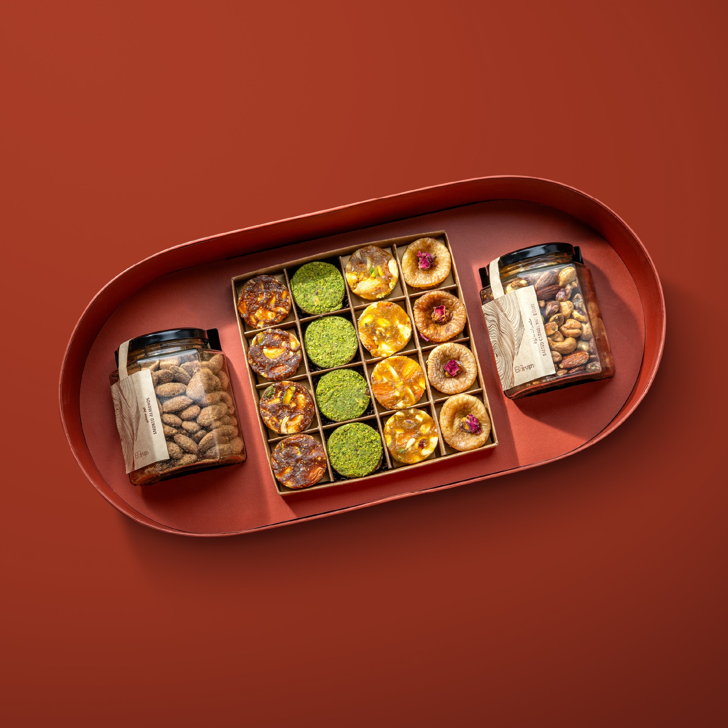 Smoked Almonds, Salted Caramel Nut Délice, Fig & Nut Bites, Ranginak, Apricot & Nut Bites, Saffron Pistachio & Rose Figs.