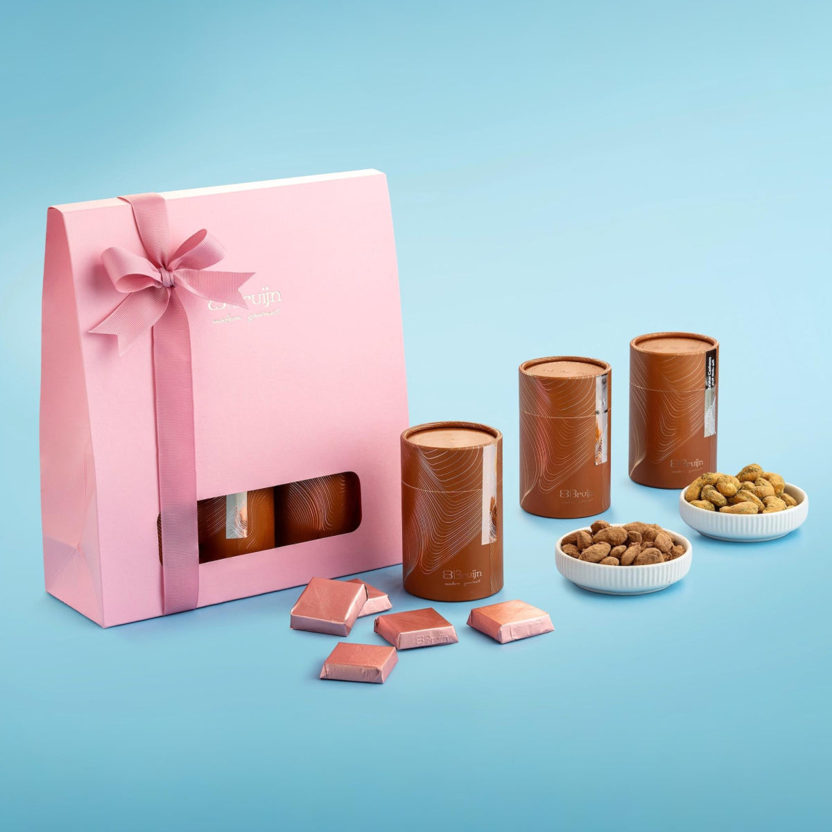Gift bag with sustainable packaging, filled with Za’atar Cashews, Cocoa Dusted Almonds, and Craft Chocolate
