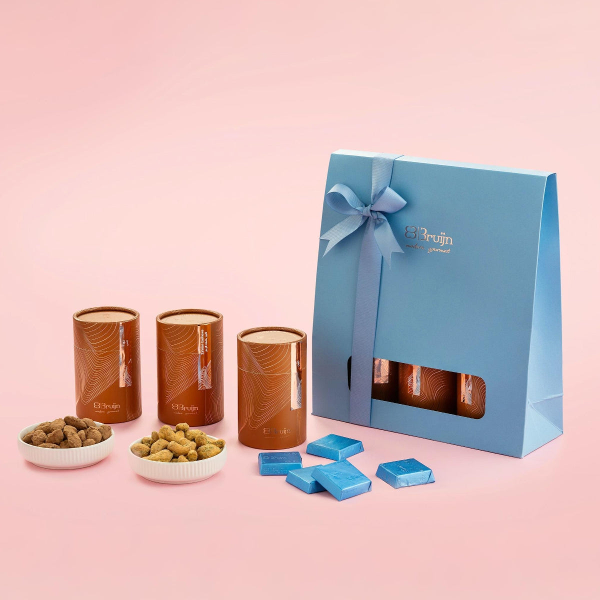 Gift bag with sustainable packaging, filled with Za’atar Cashews, Cocoa Dusted Almonds, and Craft Chocolate