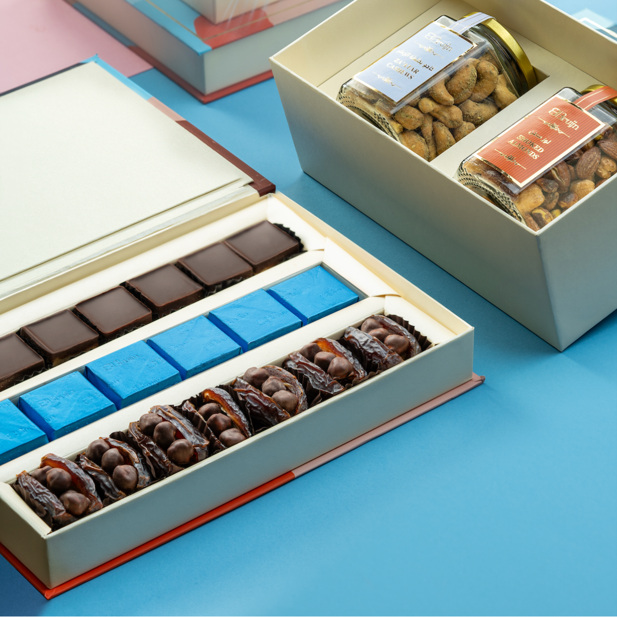 Gourmet gifting set featuring Za’atar cashews, caramel nut mix, fig tarts, dark chocolate, and hazelnut dates