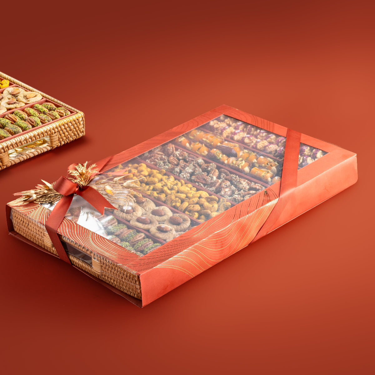 Assorted nut and dried fruit tray with protective window sleeve for gifting.