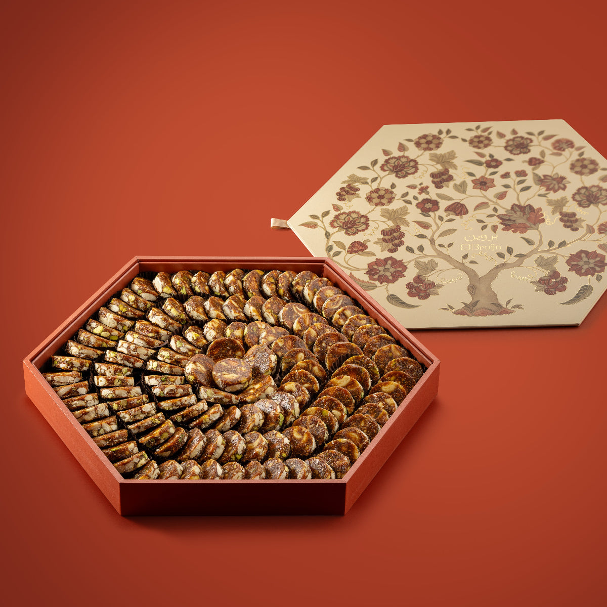 Fig & Nut Bites in tree of design in an orange gift tray.