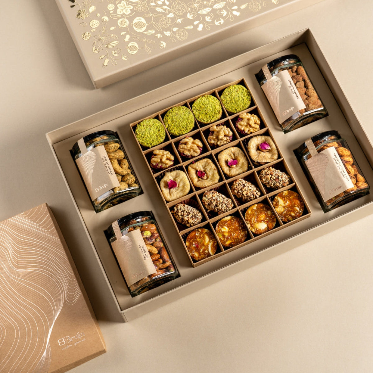 Exquisite box with Zaβatar Cashew, Smoked almonds, Lime and chilli pistachios, Salted Caramel and Nut Delice, Ranginaik, Walnut and Dried fruit wholes, Saffron pistachio and rose figs, Date truffles and Fig and Nut Bites