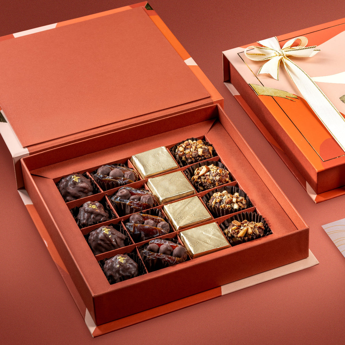 360g of 24K sprinkled almond rocks, mejdool dates stuffed with chocolate hazelnuts, pure dark chocolate with nuts, mouth melting date tamriyas.