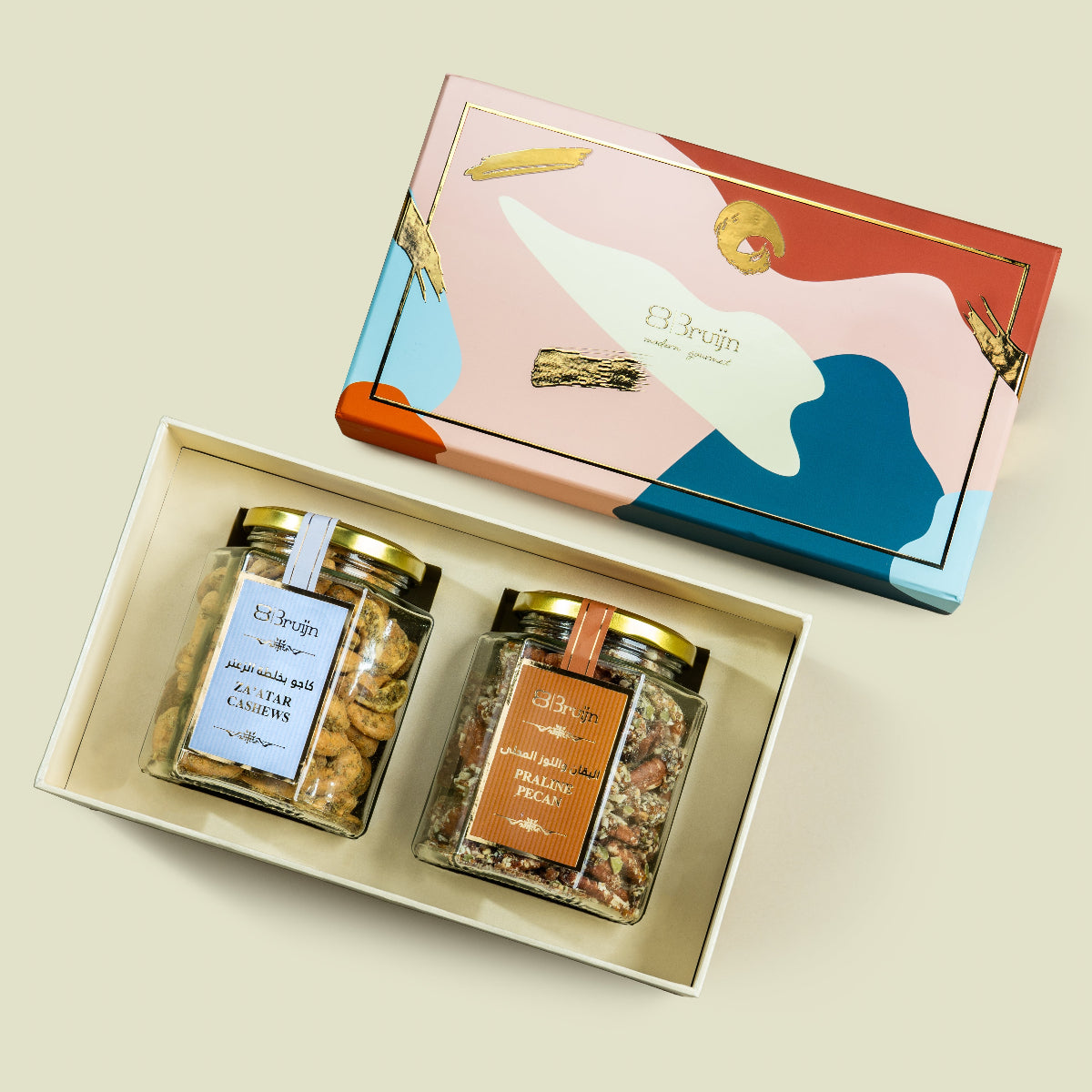 Open tower gift set showing Zaβatar cashews, praline pecans, and opulent box of figs and stuffed dates.