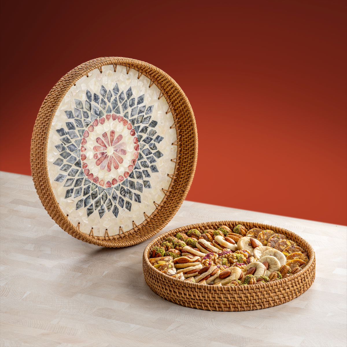 Medium 12-inch sustainable round tray filled with figs, dates, and nut assortments with a standing 14 inch sustainable tray