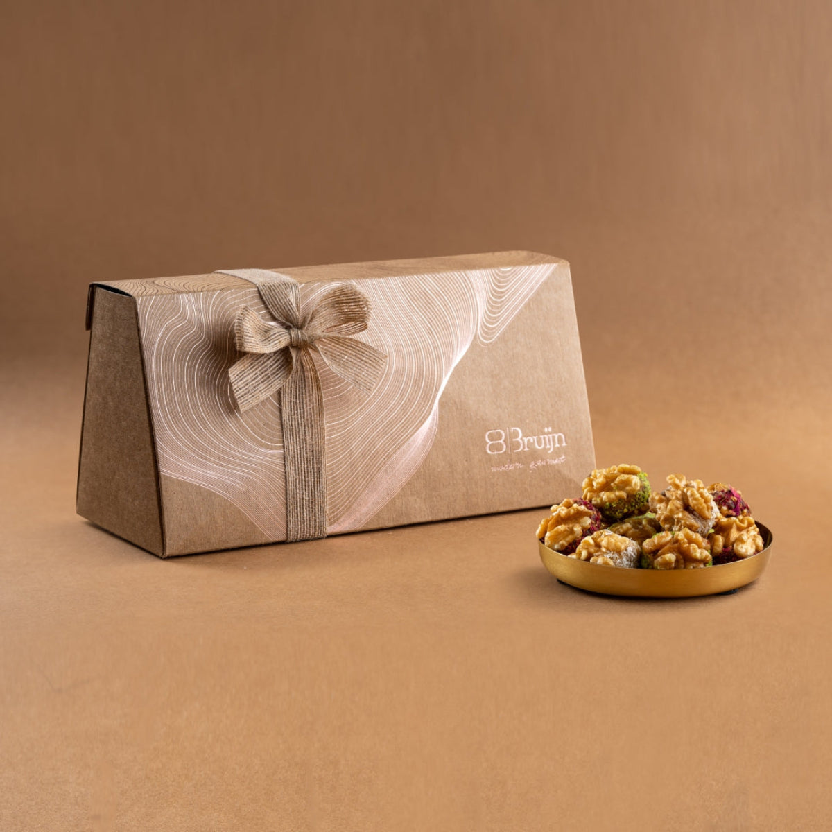 Assorted Chilean walnuts stuffed with dates, apricot & cranberry pastes, beautifully packed in a rustic gift box.
