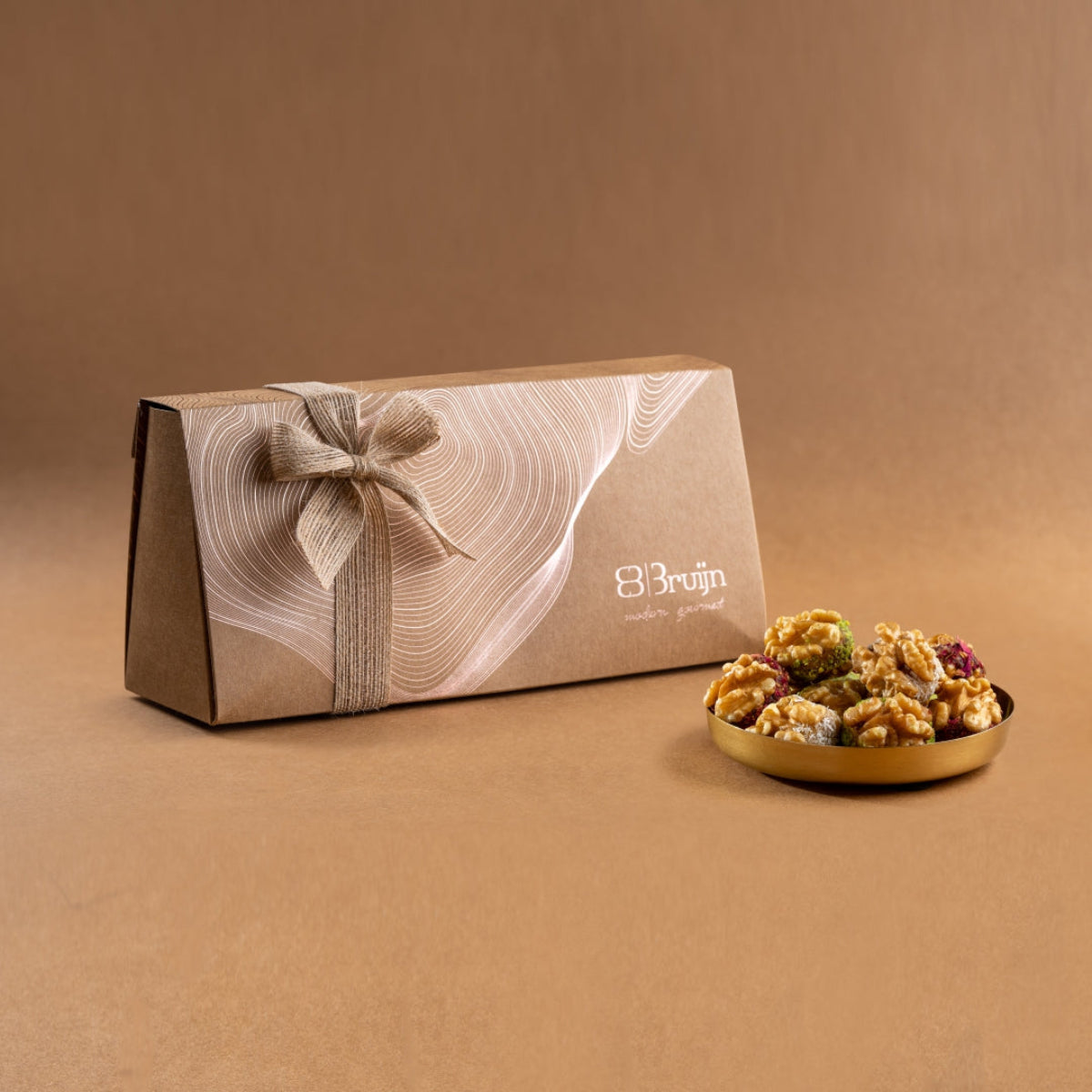 Assorted Chilean walnuts stuffed with dates, apricot & cranberry pastes, beautifully packed in a rustic gift box.
