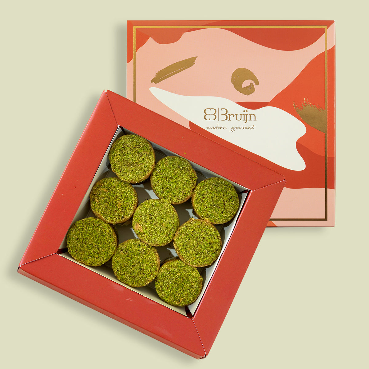 Petite gift box with 9 pieces of Ranginak, a Persian sweet made from dates, walnuts, chickpea flour, and spices.