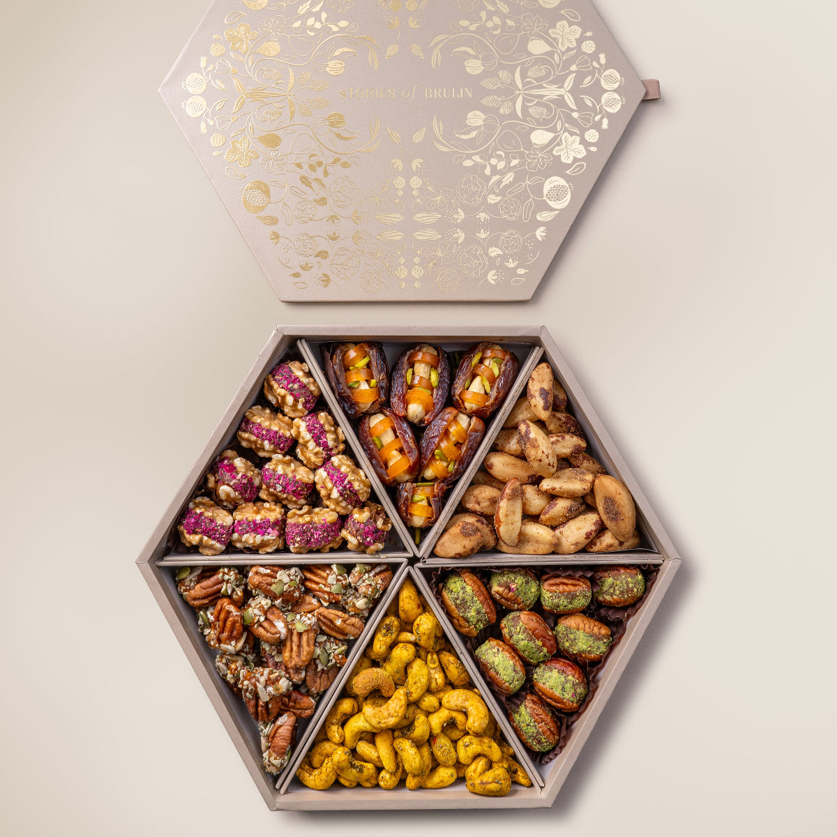 Walnut & Dried Fruit Wholes 
Dried Mango & Cashew Stuffed Dates
Smoked Brazilian Nuts
Pecan & Date Wholes
Turmeric & Chia Seeds Cashews
Praline Pecan 