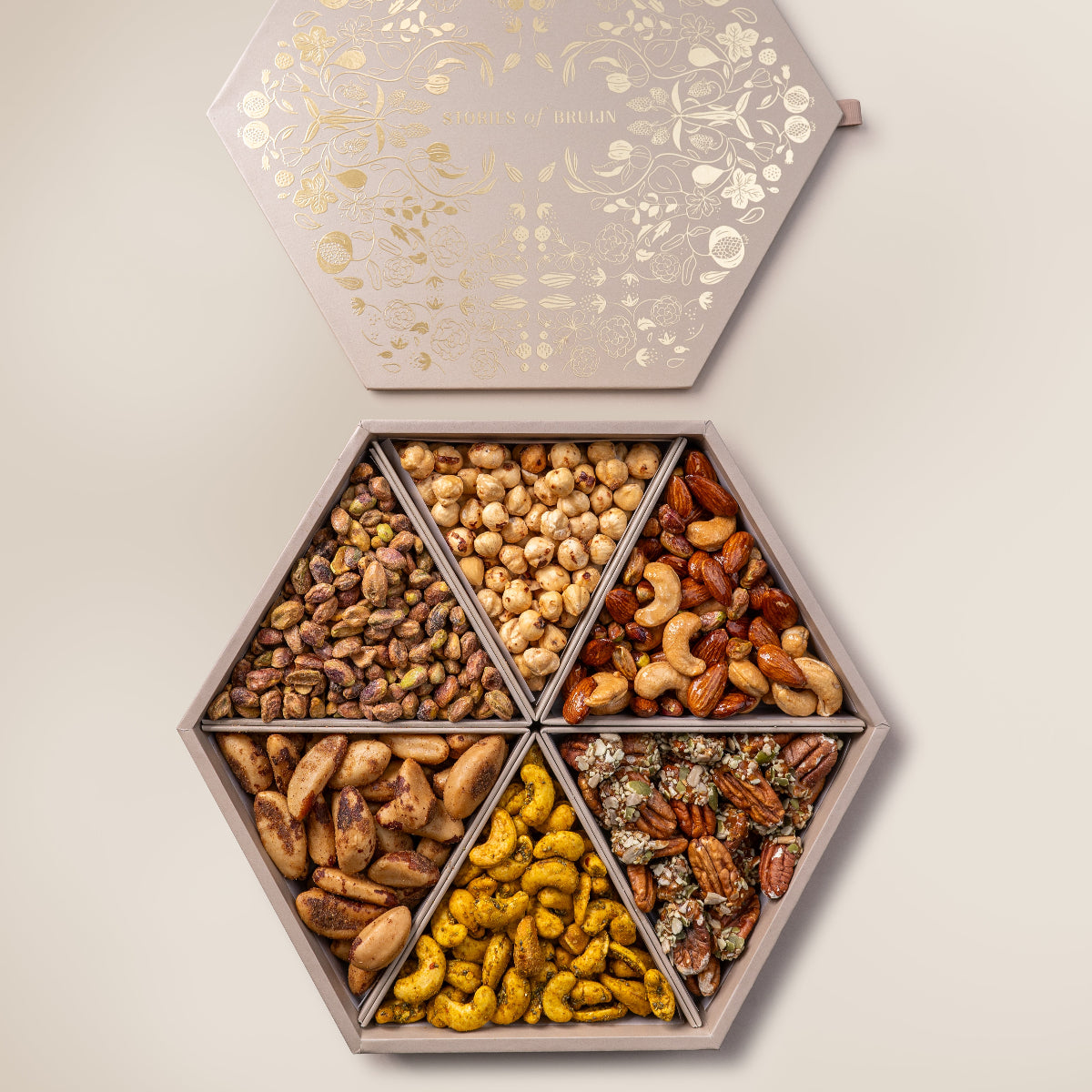 Saffron Pistachios
Spicy Caramel Hazelnuts
Salted Carmel Nut Delice 
Turmeric & Chia Seeds Cashews
Smoked Brazilian Nuts
Praline Pecan 