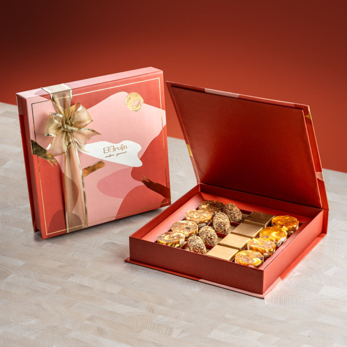 345g of our signature delight made with roasted nuts rolled in a delicious grainy fig & apricot paste, mouth melting date truffles encrusted with diced nuts and pure cacao dark chocolate with nuts.  