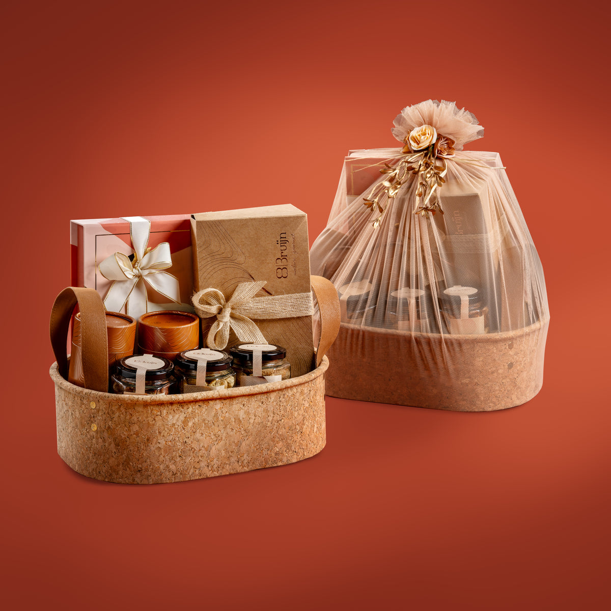 Elegant gift basket with fig & nut bites, date truffles, chocolate-dried fruit pairings, and flavored nut jars wrapped in festive packaging.