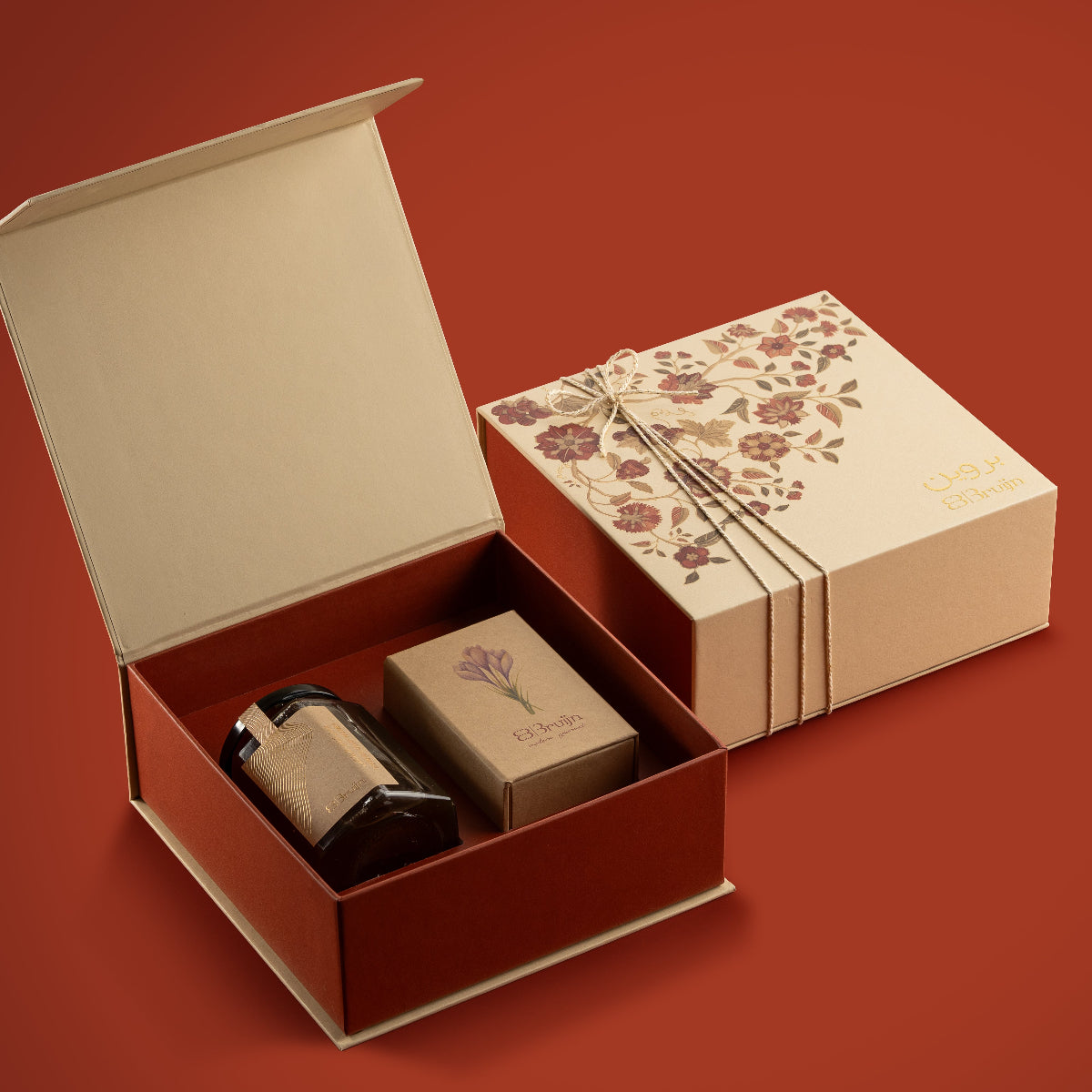 Tree of life design on a gift box in off-white & orange color with saffron & honey.