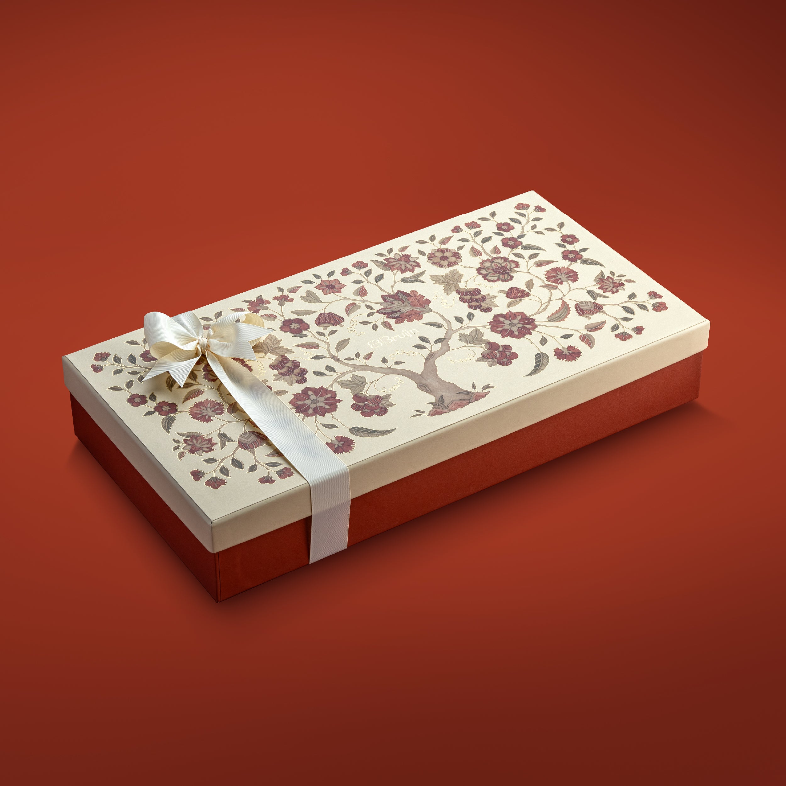 Tree of life pattern on grand exquisite box on a red background. 