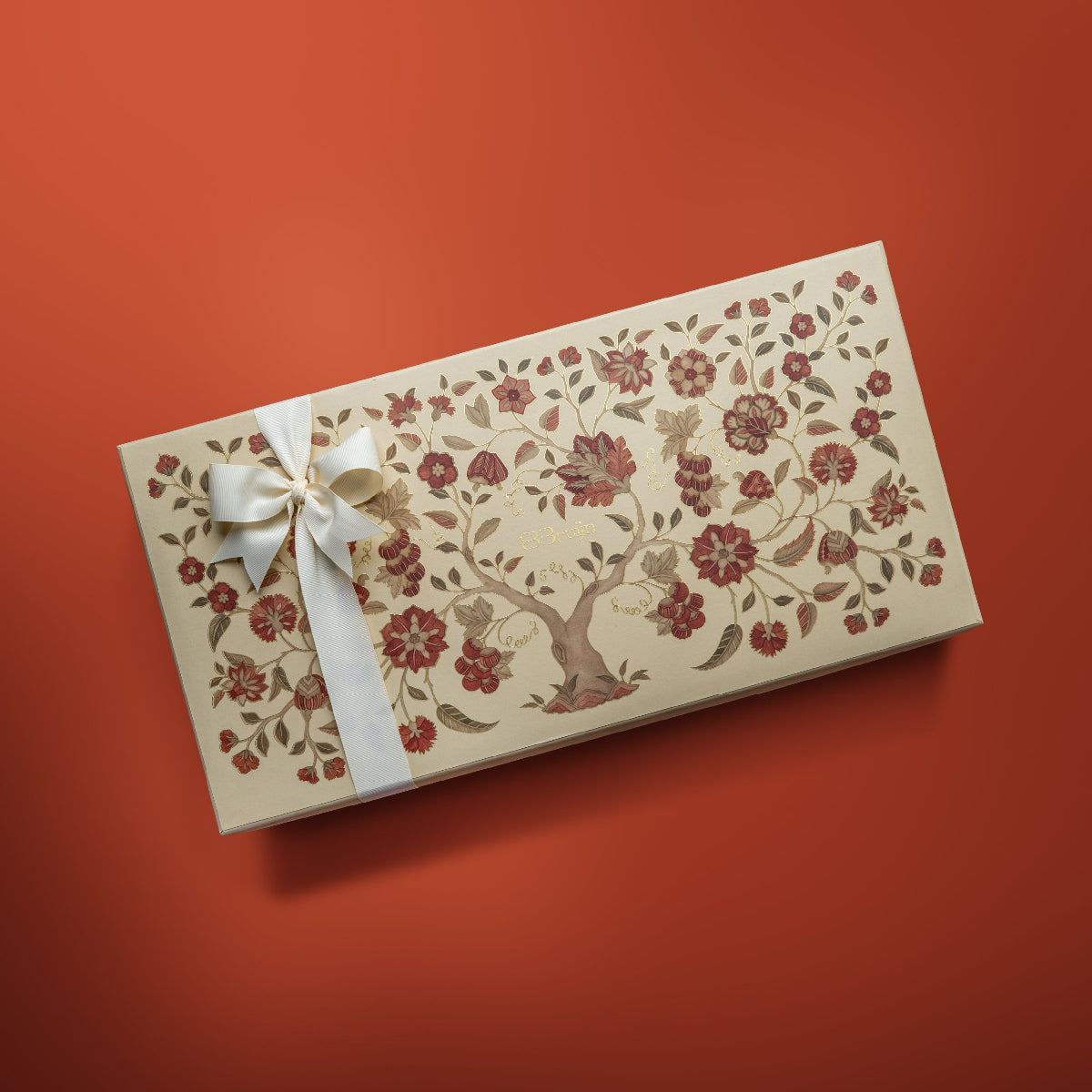 Tree of life pattern on grand exquisite box on a red background. 