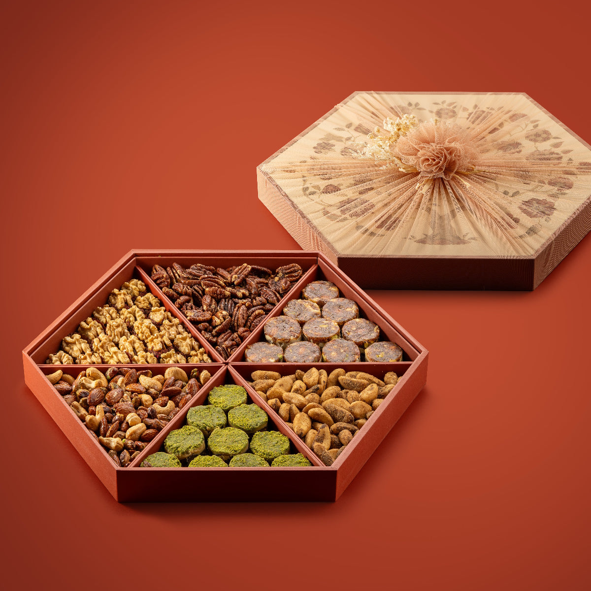 2 kg of assorted nuts and dried fruits in a orange gift tray. 