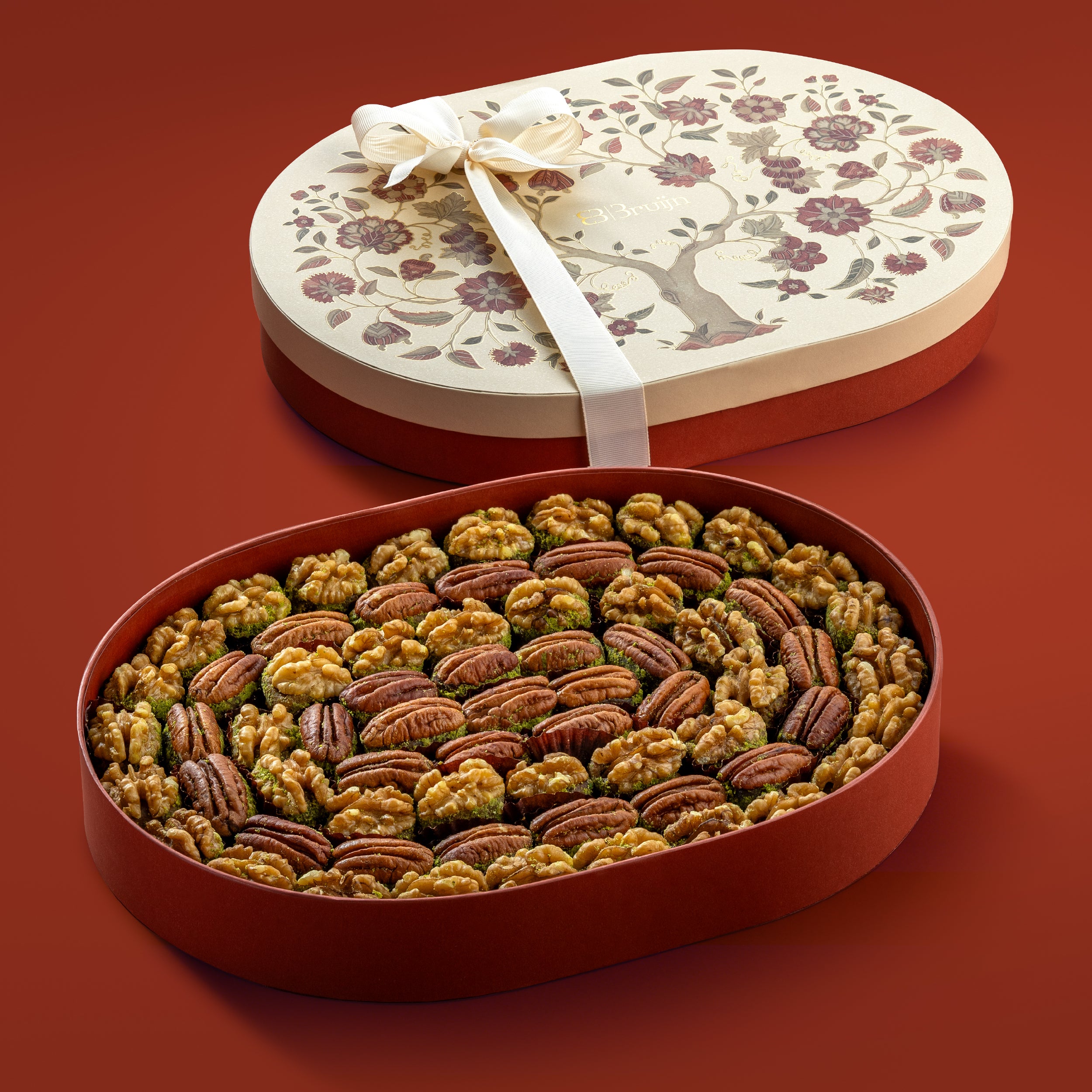 Tree of life open box with sweetest American pecans stuffed with a pure dates & pistachio and toasted Chilean walnuts stuffed with pure dates & pistachio.