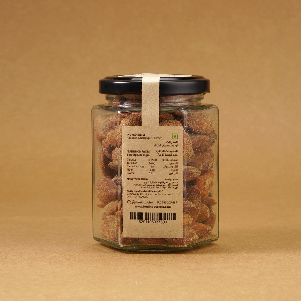 Glass jar of Bruijn Hickory Smoked Almonds with black lid and kraft label, filled with golden almonds infused with smoky hickory flavour.